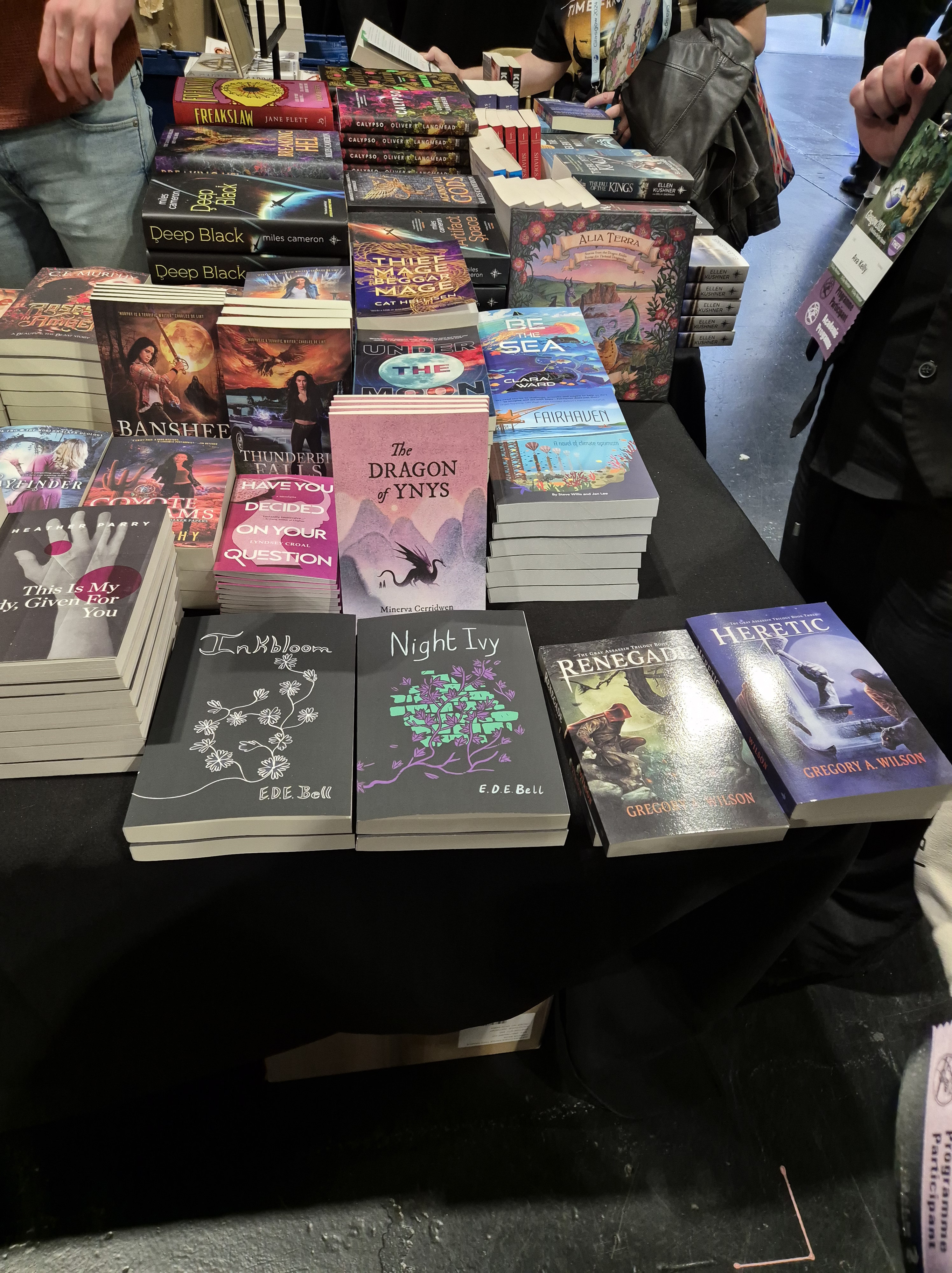 Photo of a corner of the Waterstones booth displaying several Atthis Arts titles
